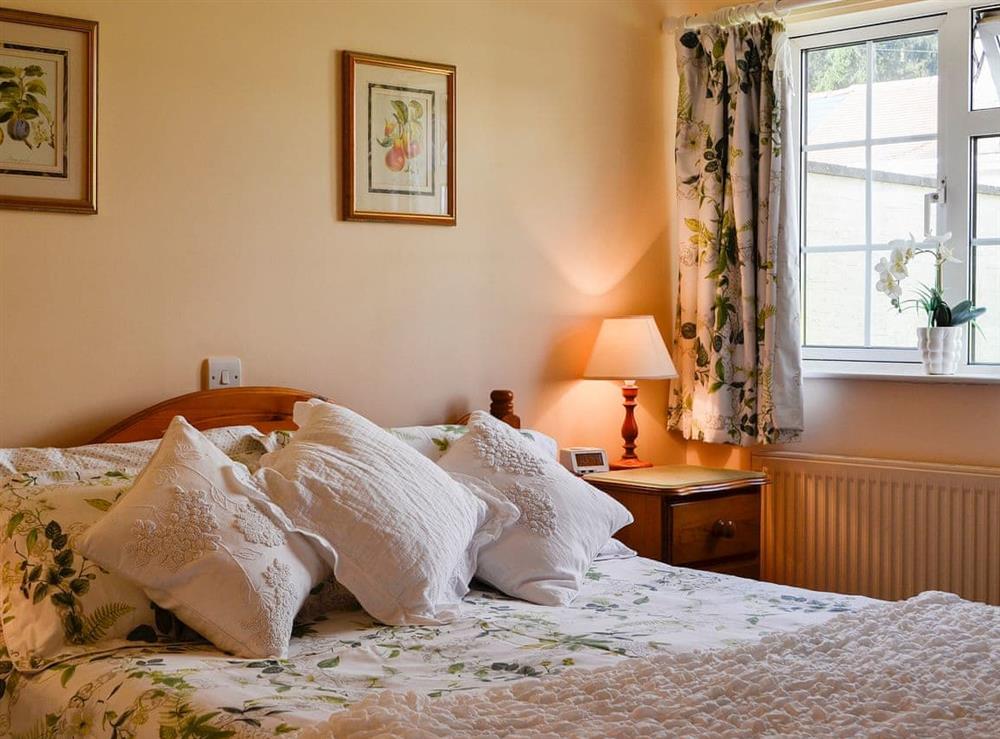 Double bedroom at Cider Press Cottage in Blakeney, Gloucestershire
