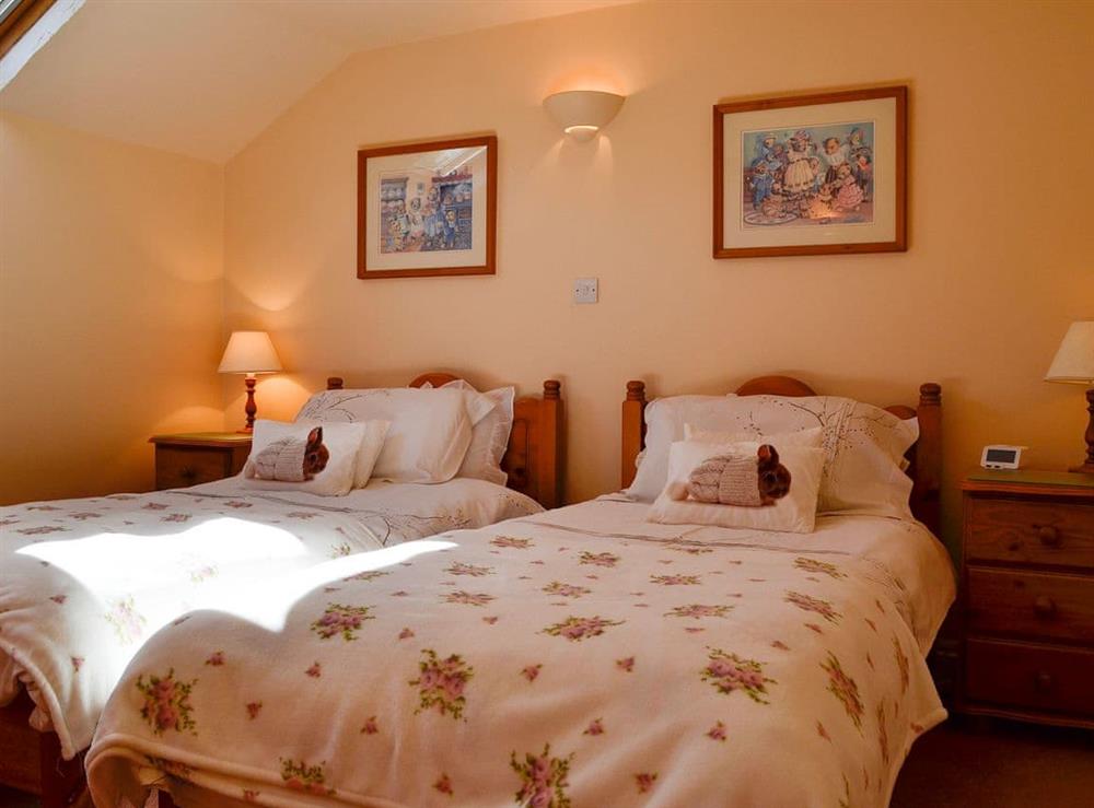Twin bedroom at Cider Press Cottage in Blakeney, Gloucestershire