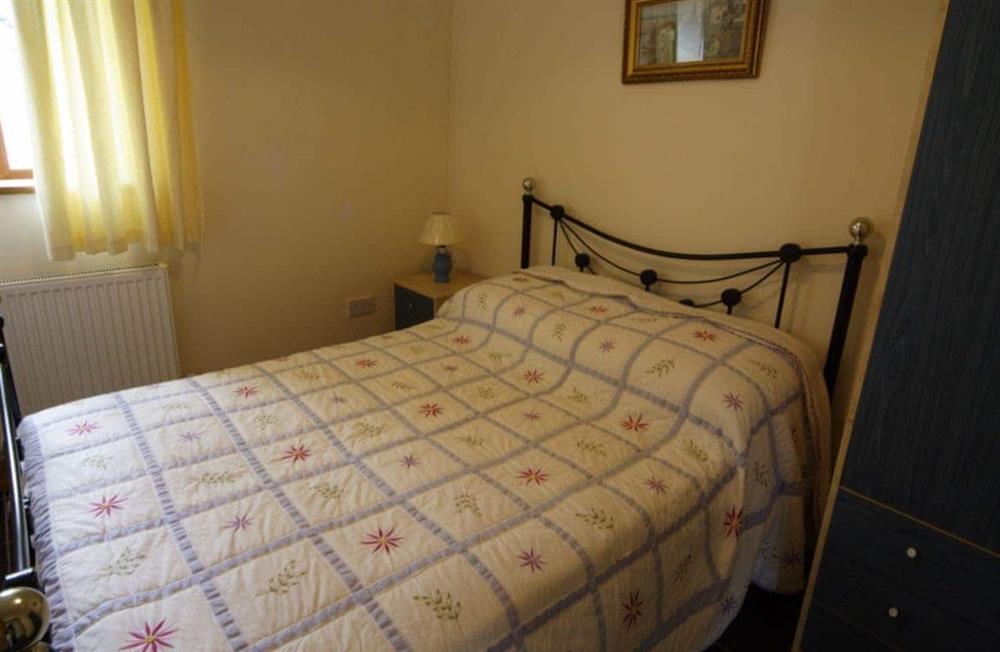 Ciliau Isaf double bedroom at Ciliau Isaf in Pwllheli, Gwynedd