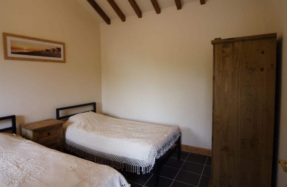 Ciliau Isaf twin bedded room at Ciliau Isaf in Pwllheli, Gwynedd