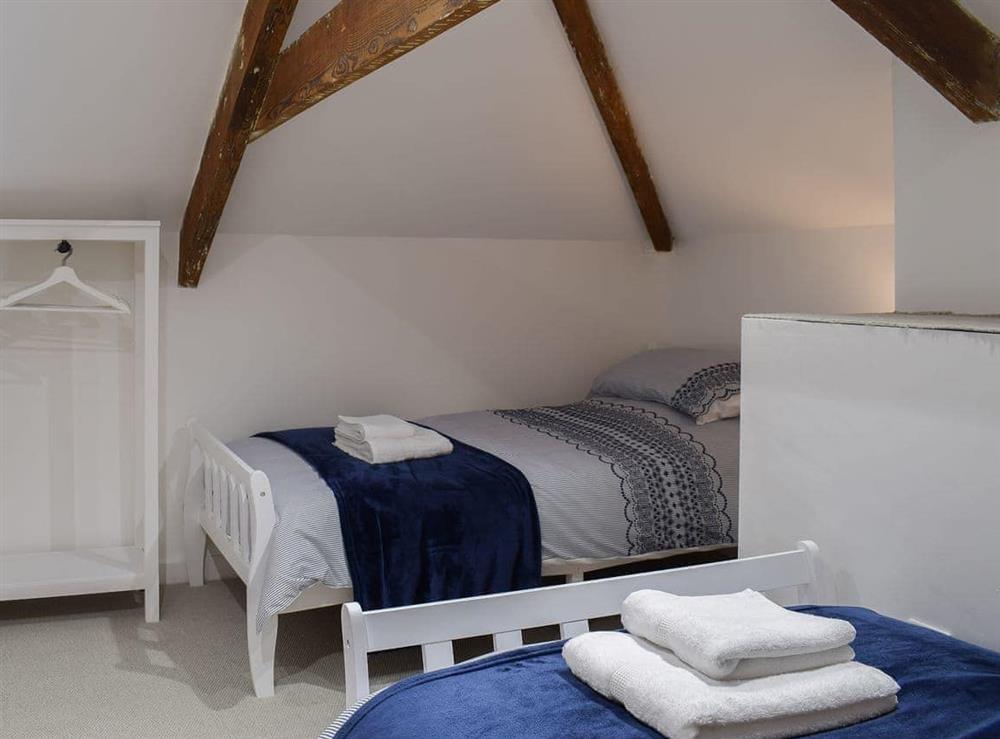 Good-sized twin bedroom at Cilwendeg Lodge in Boncath, near Cardigan, Pembrokeshire, Dyfed