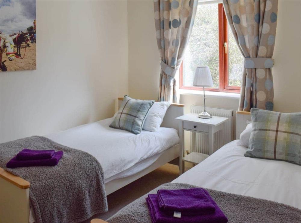 Cosy twin bedroom at Cinder Warren in Whitby, North Yorkshire