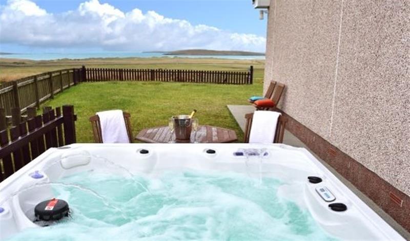 Enjoy the swimming pool at Clachan Sands Cottage, Lochmaddy