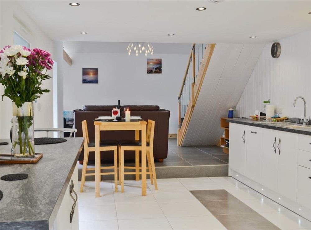 Open plan living/dining room/kitchen (photo 4) at Clam Cottage in Amroth, near Saundersfoot, Dyfed