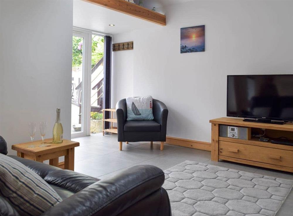 Open plan living space at Clam Cottage in Amroth, near Saundersfoot, Dyfed