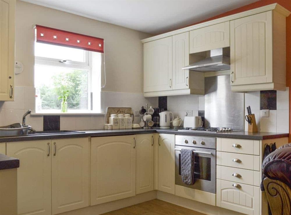 Well-equipped fitted kitchen at Daffodil, 