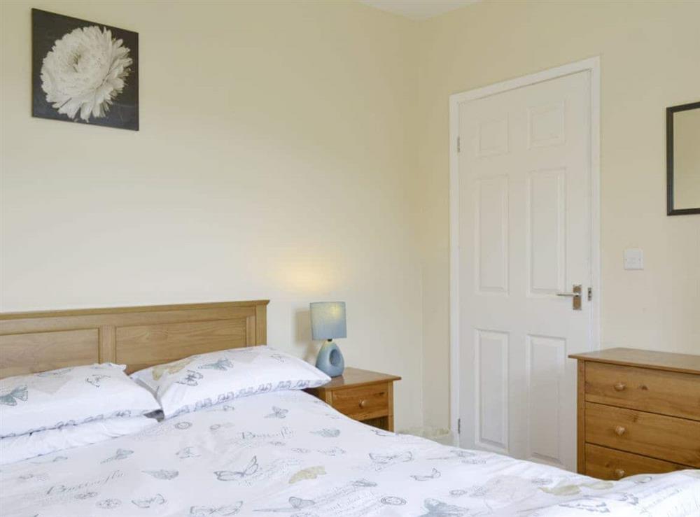 Relaxing double bedroom at Snowdrop Cottage, 