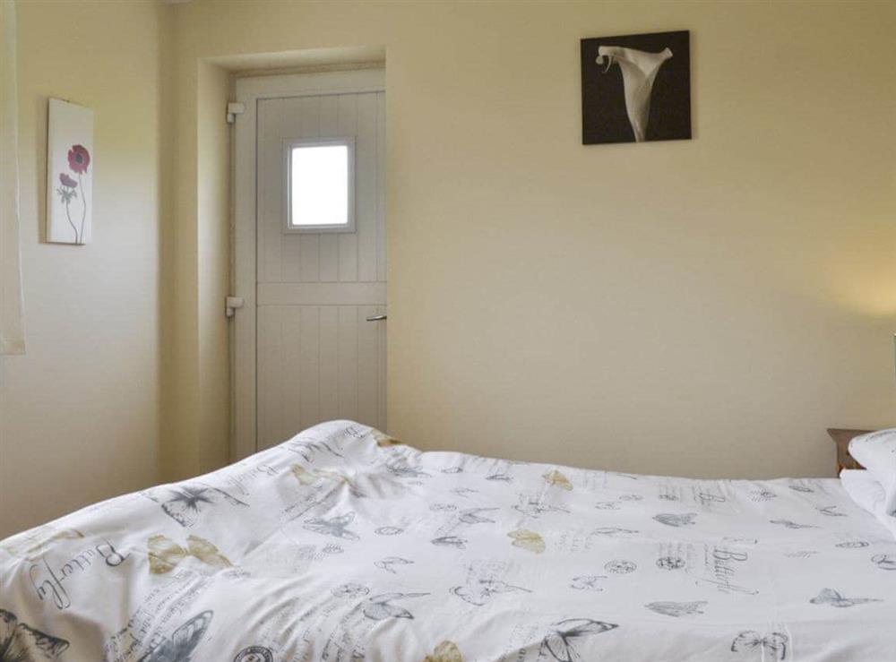 Spacious double bedroom at Snowdrop Cottage, 