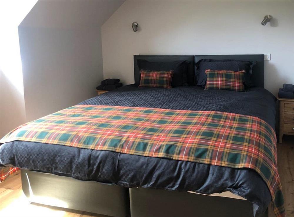 Double bedroom at Clarinnes Cottage in Rowardennan, Lanarkshire