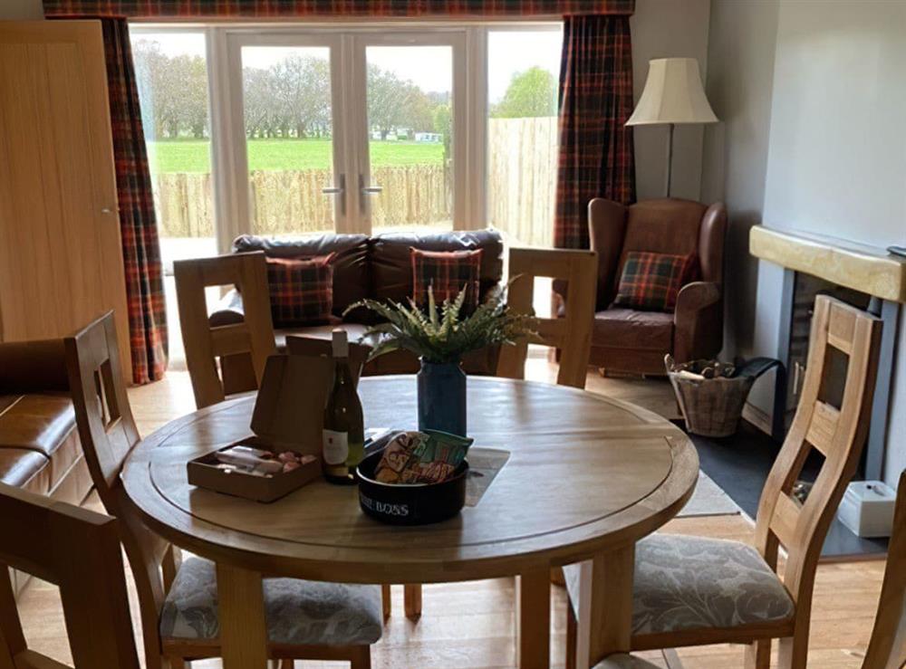 Living room/dining room at Clarinnes Cottage in Rowardennan, Lanarkshire