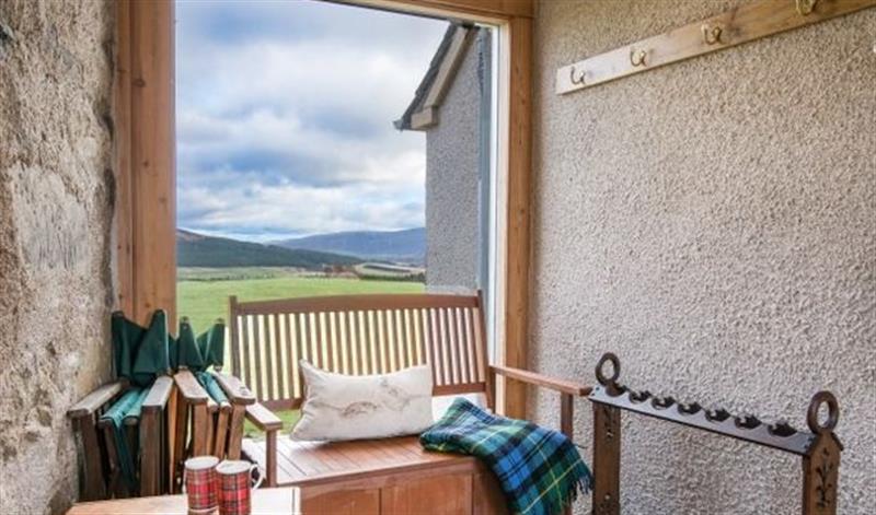 Relax in the living area (photo 2) at Clashindeugle Farmhouse & Annex, Grantown-on-Spey