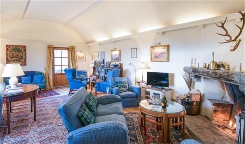 Relax in the living area at Clashindeugle Farmhouse & Annex, Grantown-on-Spey