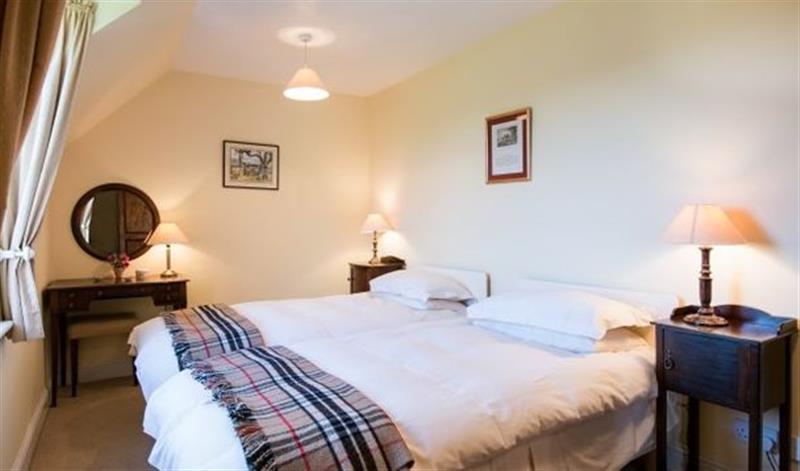 This is a bedroom at Clashindeugle Farmhouse & Annex, Grantown-on-Spey