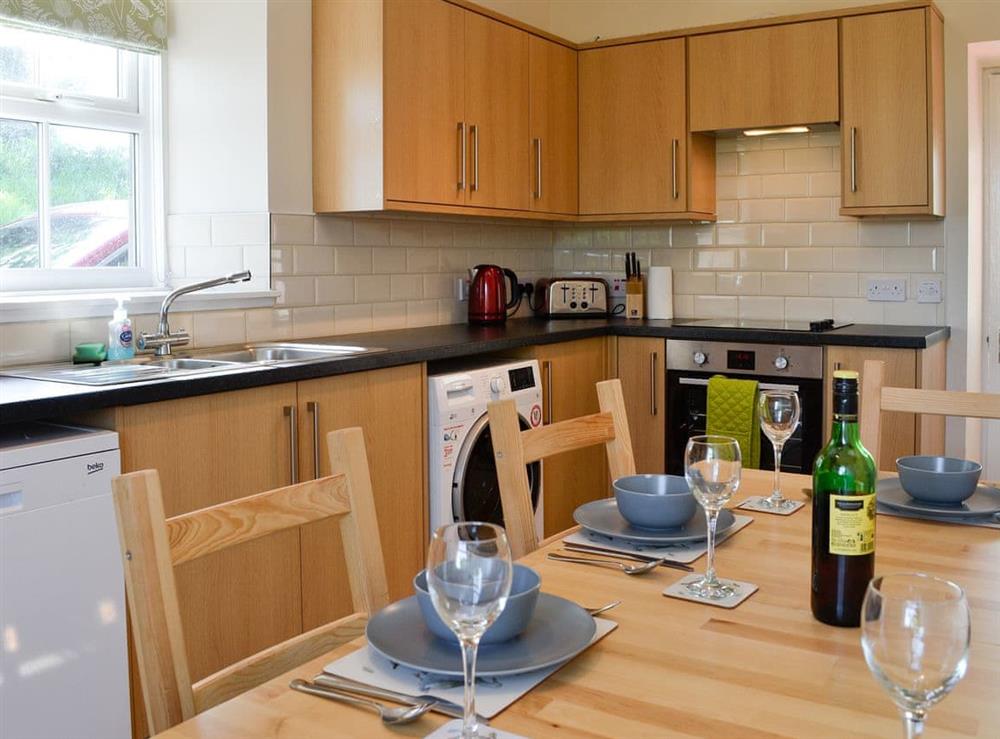 Kitchen with dining area at Clayhills Cottage in Blairgowrie, Perthshire