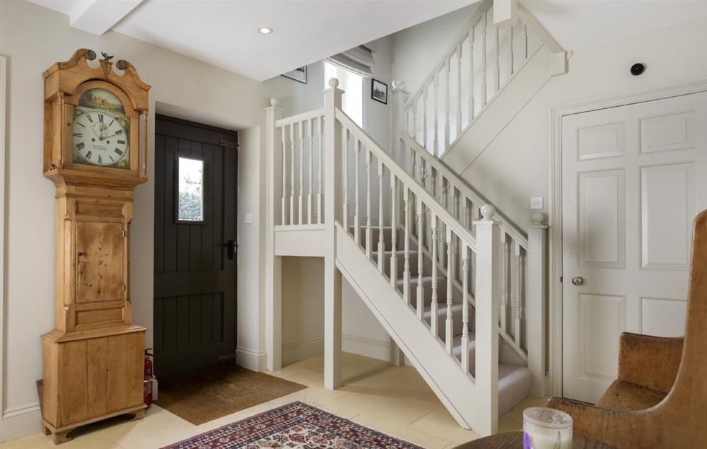 Entrance hall with staircase to first floor bedrooms at Claytons Cottage, Lower Oddington