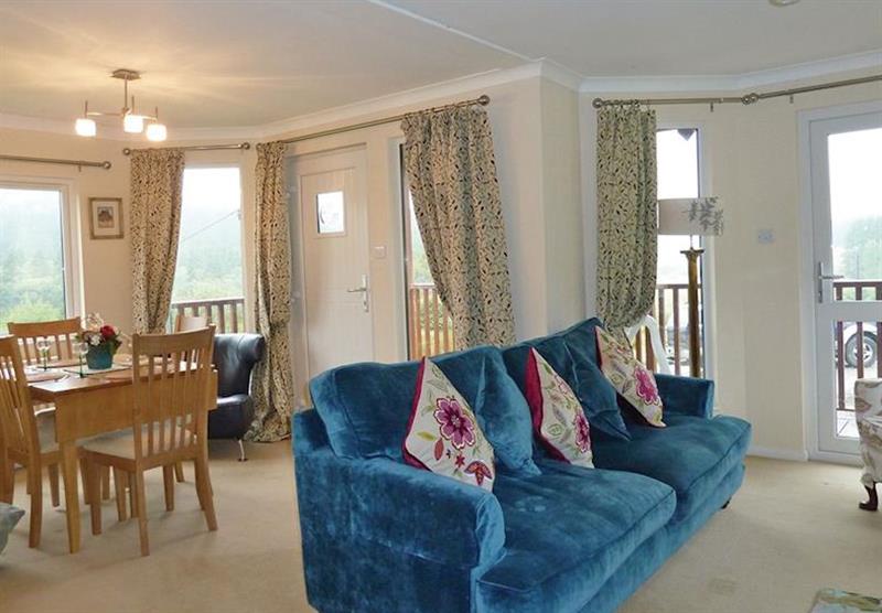 Living room and dining area in Eagles View at Clear Sky Lodges in Kielder, Northumberland