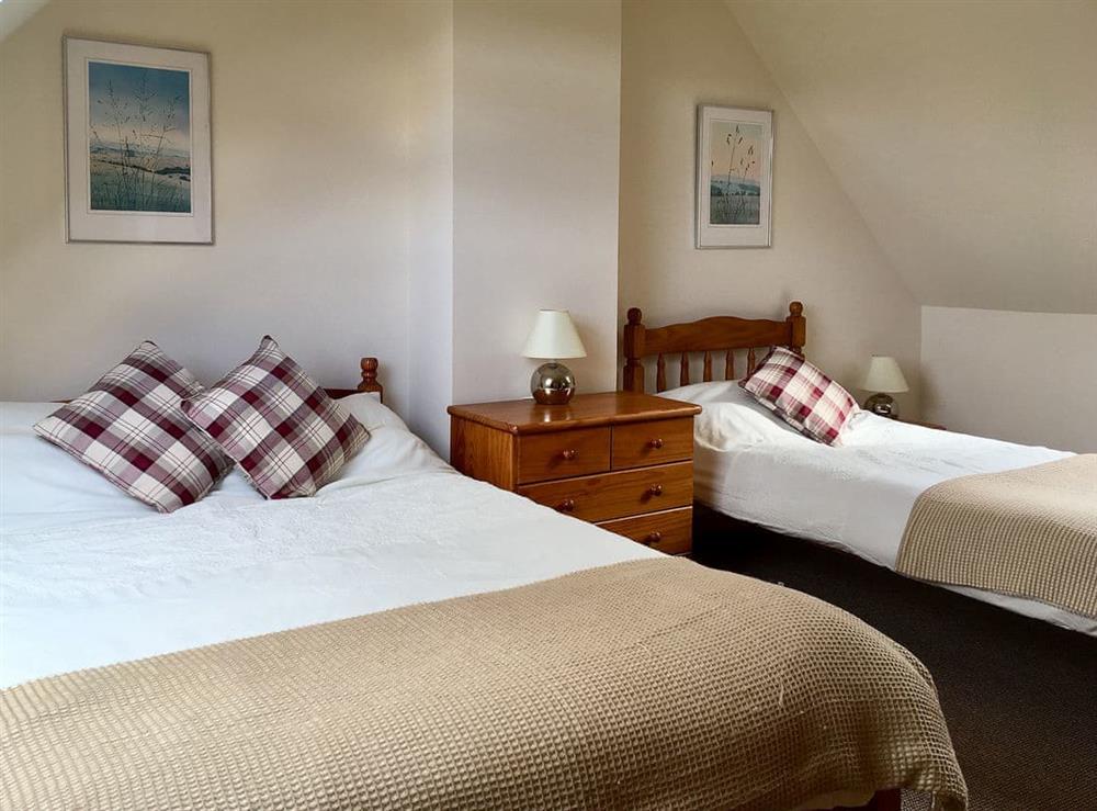 Bedroom with double and single beds at Clear Waters in Dornie, near Kyle of Lochalsh, Highlands, Ross-Shire