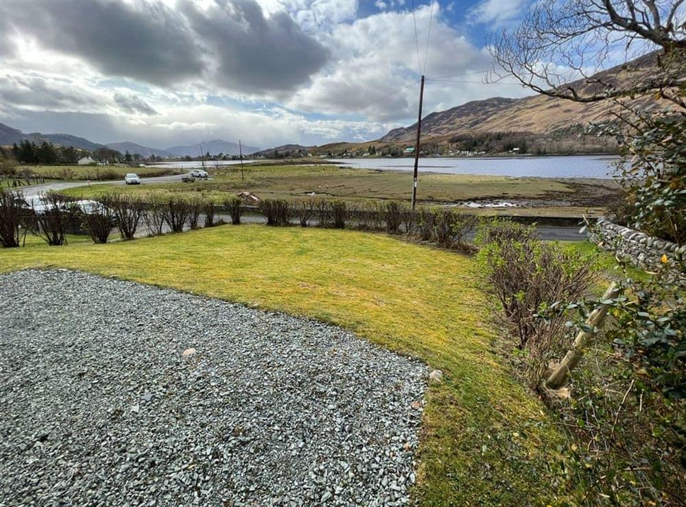 Garden with countryside views at Clear Waters in Dornie, near Kyle of Lochalsh, Highlands, Ross-Shire