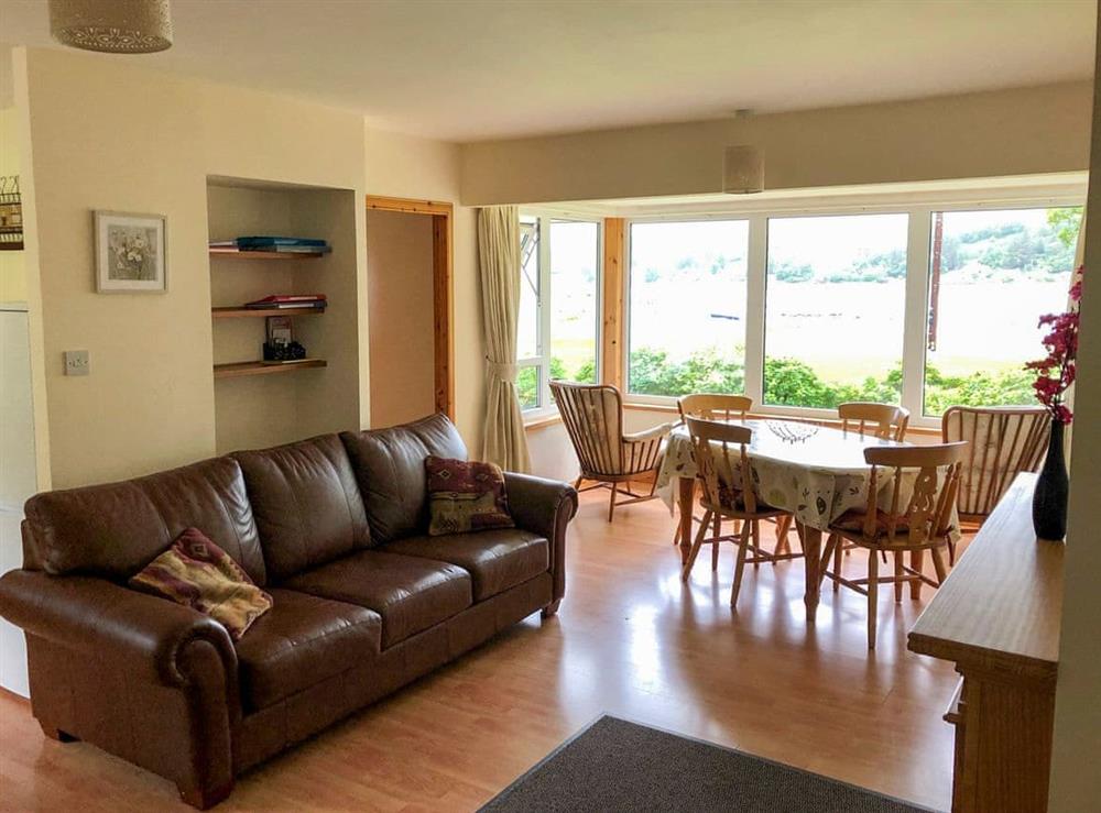 Light and airy dining area with Loch views at Clear Waters in Dornie, near Kyle of Lochalsh, Highlands, Ross-Shire