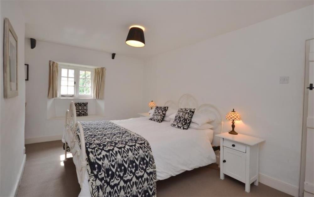 The beautiful master bedroom at Clematis Cottage in Bantham