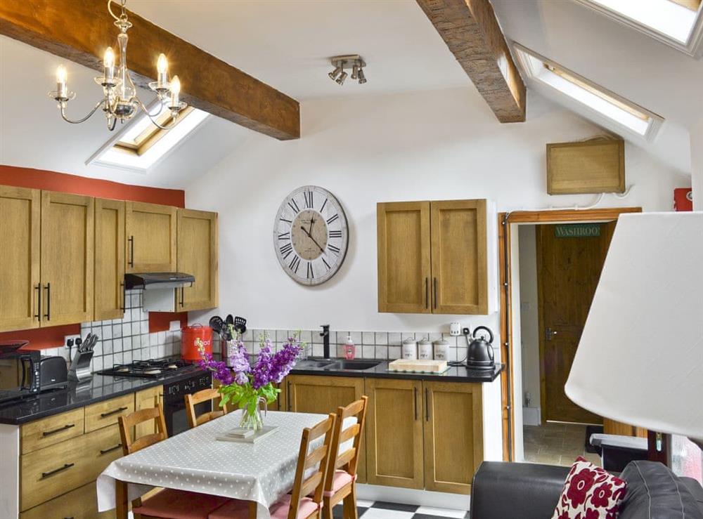 Open plan living/dining room/kitchen (photo 2) at Clematis Cottage in Matlock, Derbyshire