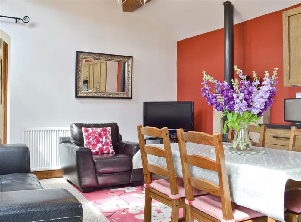 Open plan living/dining room/kitchen at Clematis Cottage in Matlock, Derbyshire