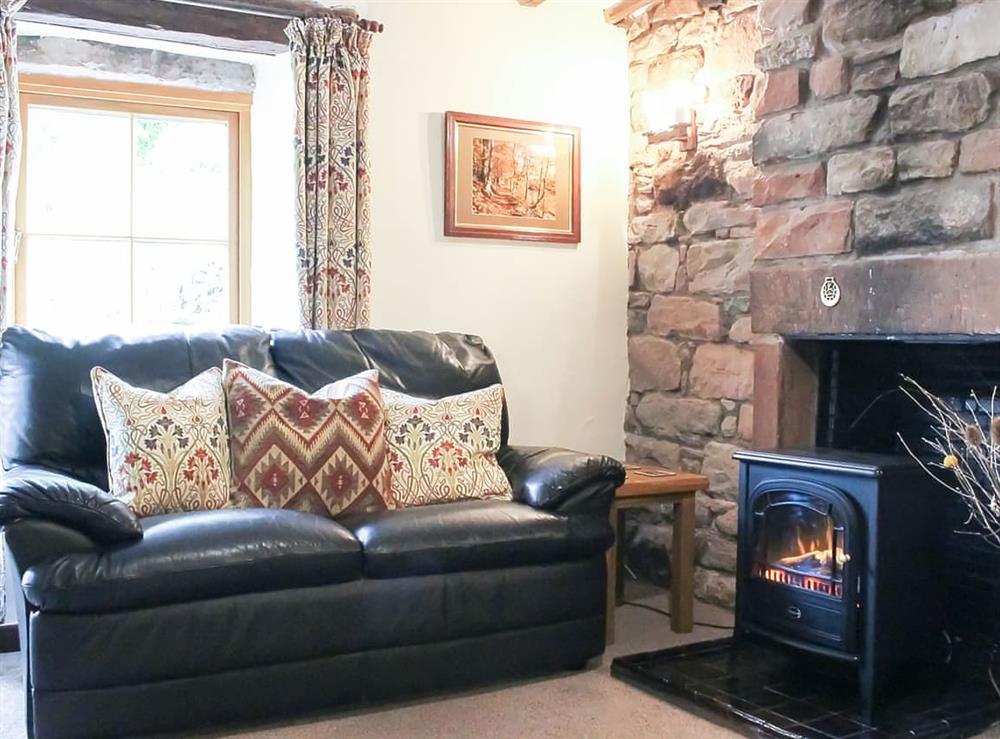 Living room at Clematis Cottage in Yanwath, near Pooley Bridge, Cumbria