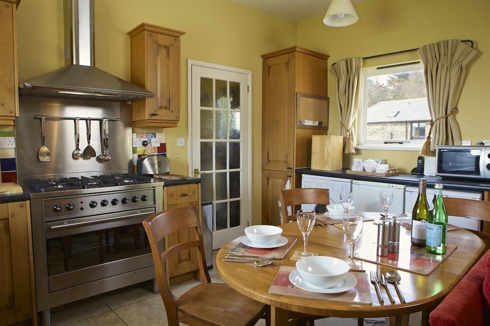 Farmhouse style kitchen (photo 2) at Clementine Cottage in Malborough, Nr Salcombe