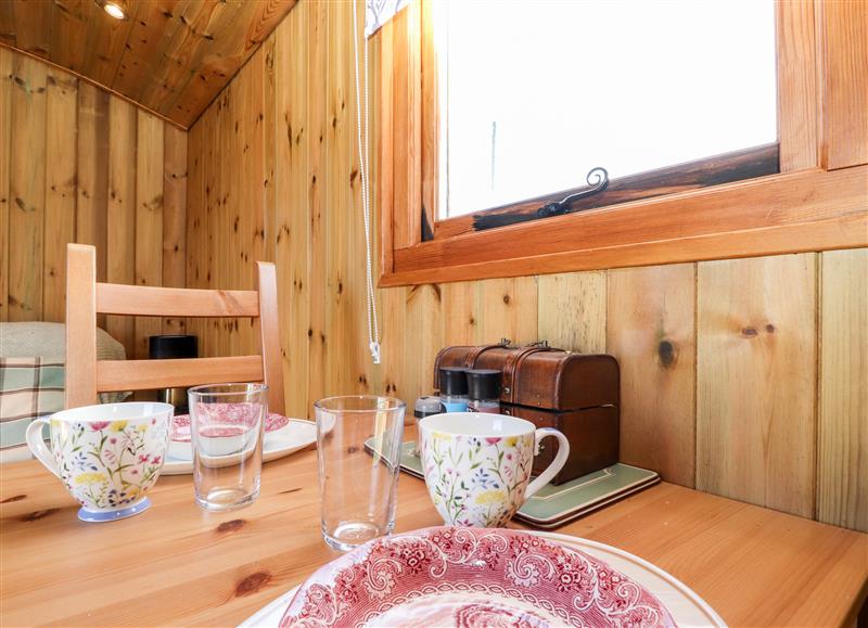 Relax in the living area at Clementine Shepherds Hut, Dumfries