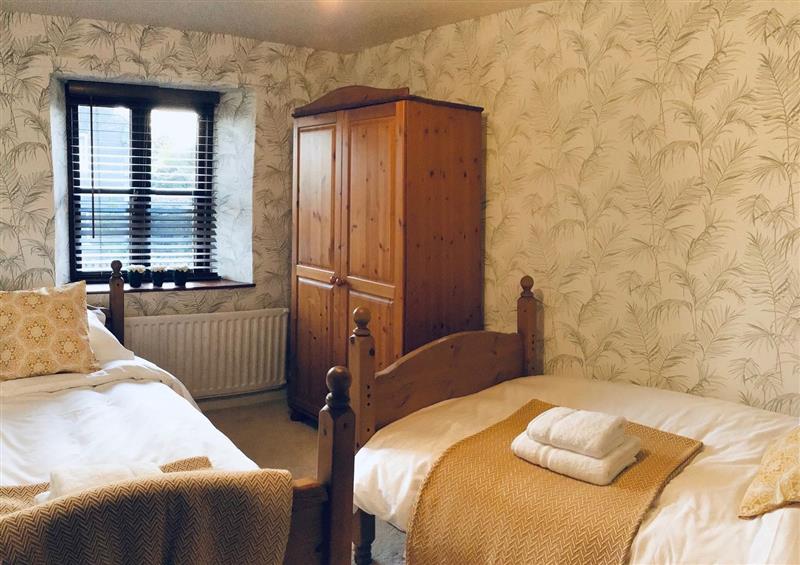 Twin bedroom at Clerk Beck Cottage, Ulverston, Cumbria