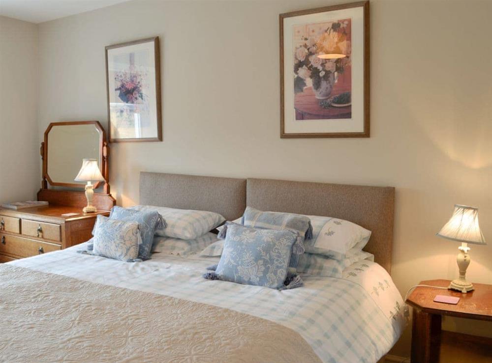 Comfortable double bedroom at Cleughbrae Cottage in Dalry, near Castle Douglas, Kirkcudbrightshire