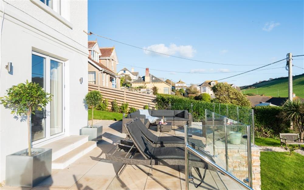 The sun terrace with sun loungers, and a comfortable outdoor sofa.  at Clevedon in Hope Cove