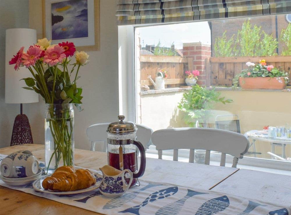 Charming dining area at Cleveland Way Cottage in Skinningrove, near Saltburn-by-the-Sea, Cleveland