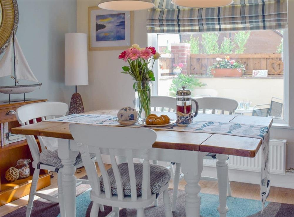 Delightful dining area at Cleveland Way Cottage in Skinningrove, near Saltburn-by-the-Sea, Cleveland