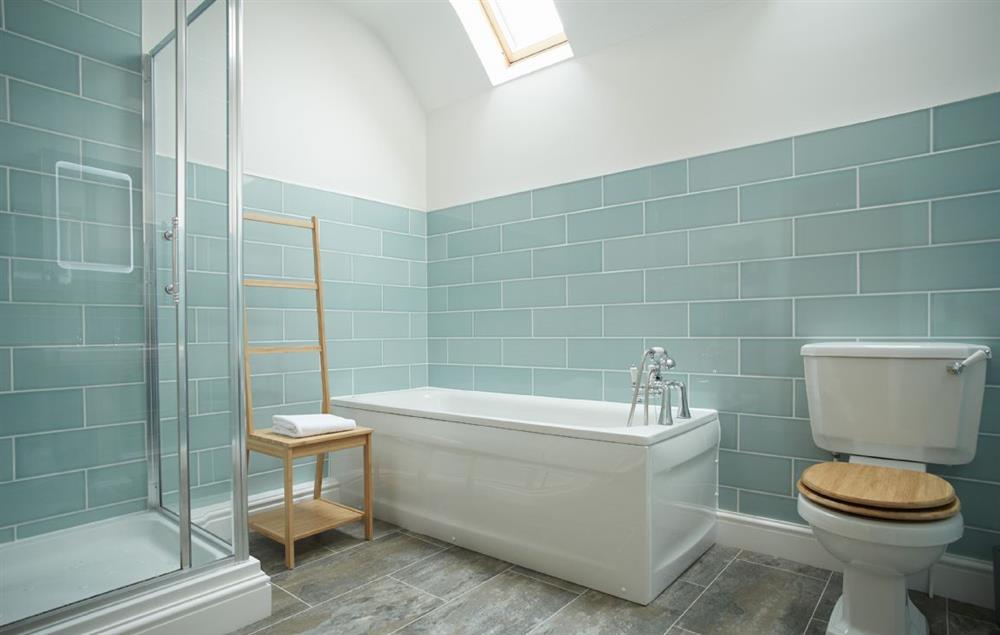 Bathroom with bath and separate shower at Clicketts Heath, Saundersfoot