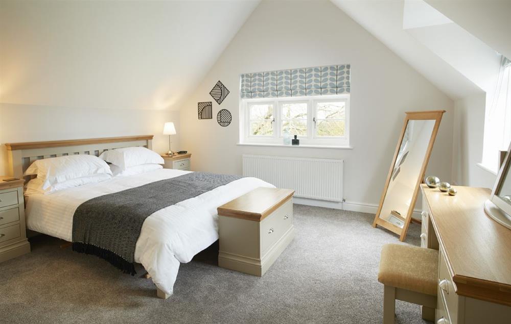 Bedroom with 6’ super king-size bed at Clicketts Heath, Saundersfoot