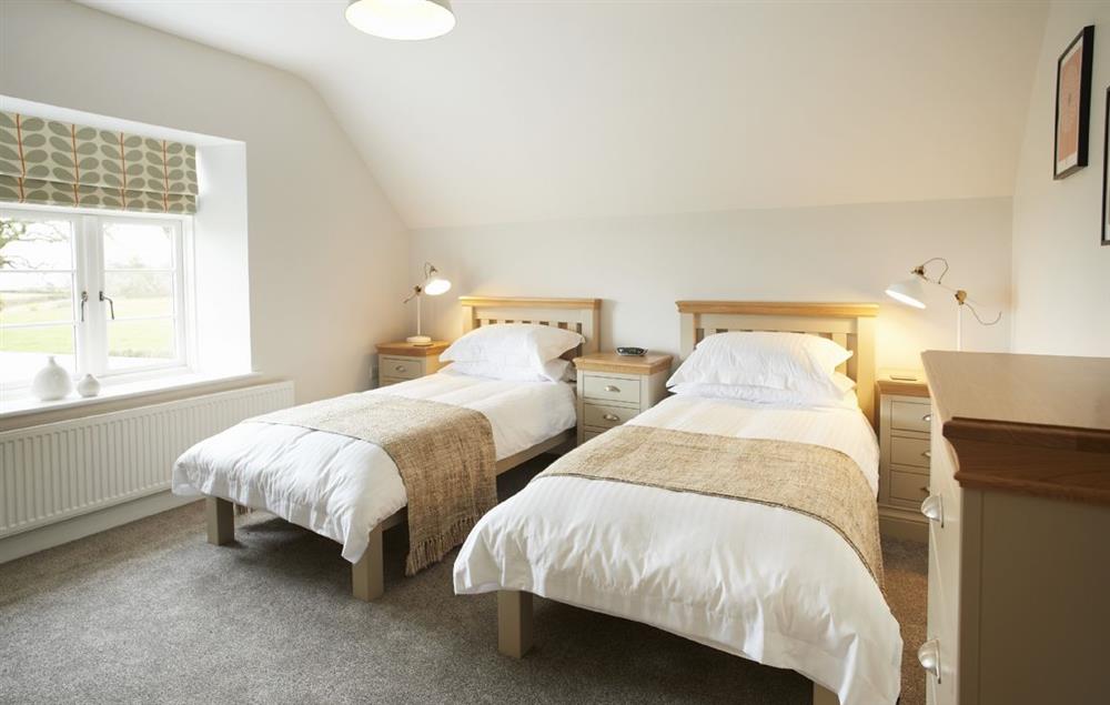Bedroom with twin 3’ single beds at Clicketts Heath, Saundersfoot