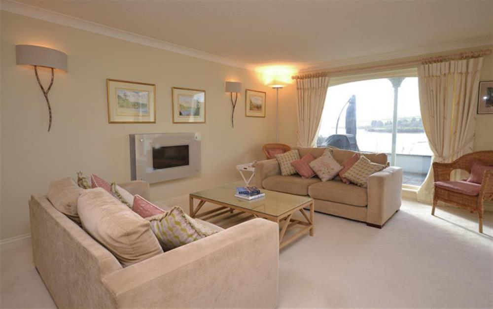 Another view of the living room showing the access to the terrace and the views of the water at Cliff Crest in Kingsbridge
