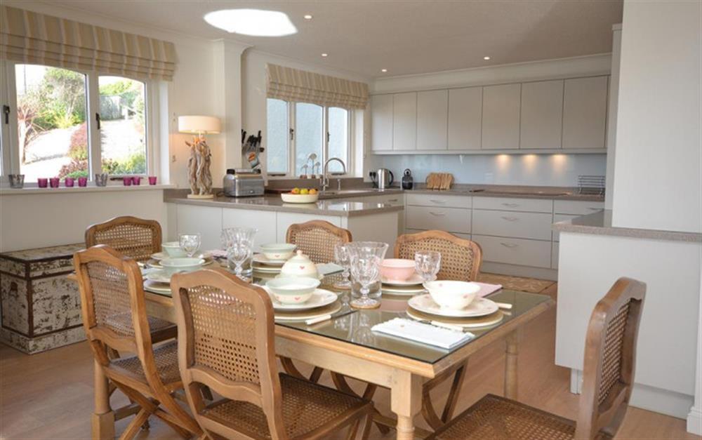 The dining area and kitchen at Cliff Crest in Kingsbridge