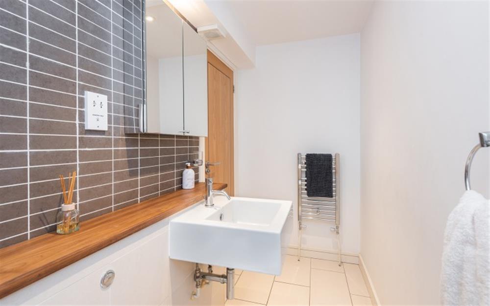 Shower room with sink at Cliff View in Seaton