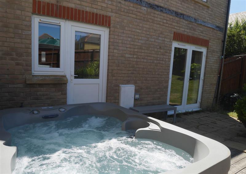Relax in the hot tub at Cliffwalk Cottage, Southwell