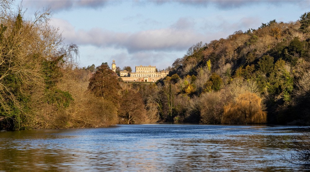 A view of Cliveden looking along the River Thames at Cliveden Ferry Cottage in Nr Maidenhead, Berkshire