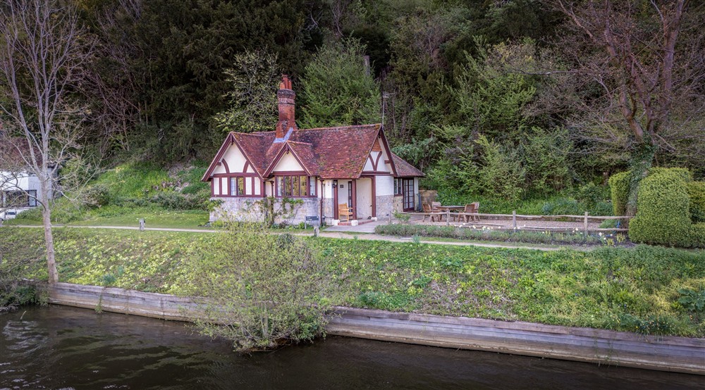 Cliveden Ferry Cottage, a single-storey cottage on the bank of the River Thames, Berkshire at Cliveden Ferry Cottage in Nr Maidenhead, Berkshire