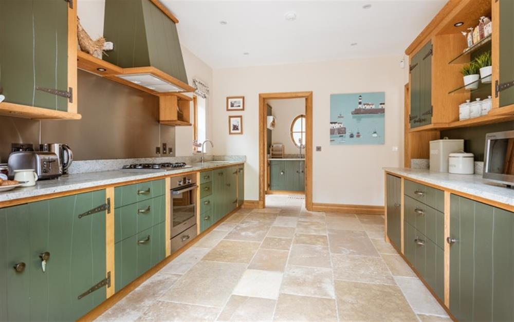 This is the kitchen (photo 3) at Clobb Copse Cottage in Beaulieu