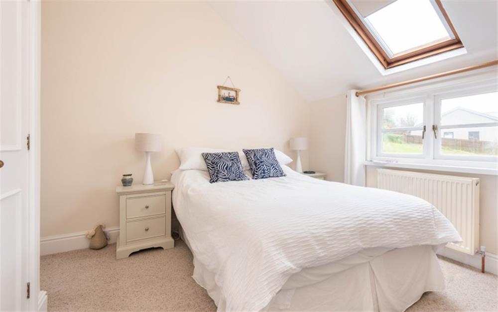 Bright ground floor bedroom with standard 4'6" double bed at Clock Cottage in Dittisham