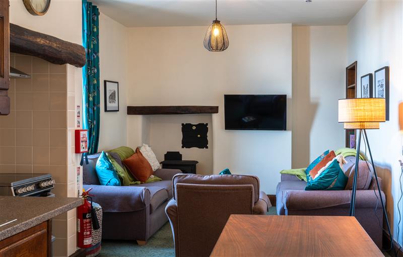 Relax in the living area at Clock Tower Apartment, Berrynarbor near Ilfracombe