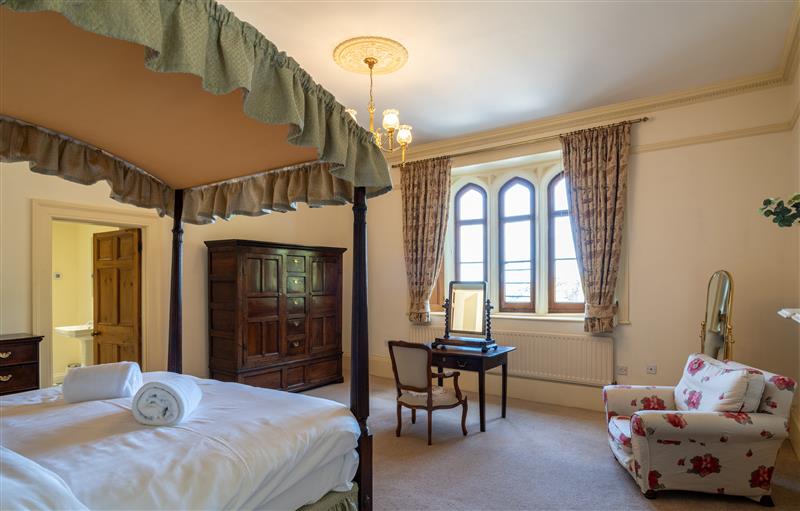 This is a bedroom (photo 5) at Clock Tower Apartment, Berrynarbor near Ilfracombe