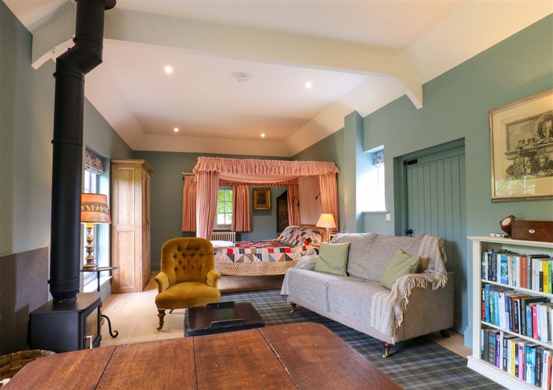Relax in the living area at Clock Tower, Stowupland