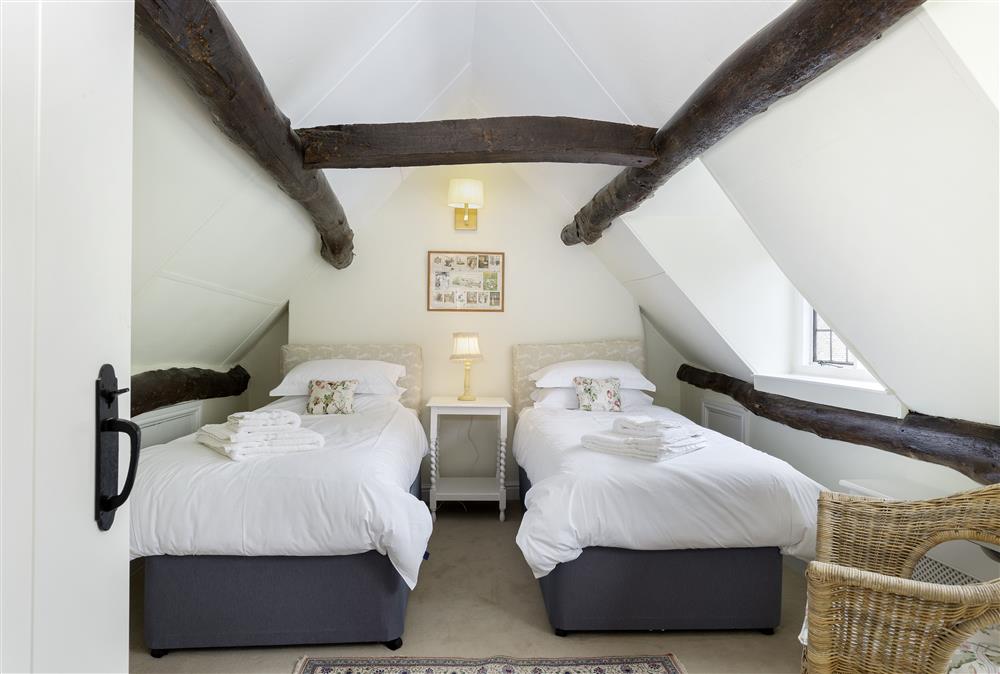 The charming twin bedroom, up on the second floor at Closes Farm Cottage, Broadway