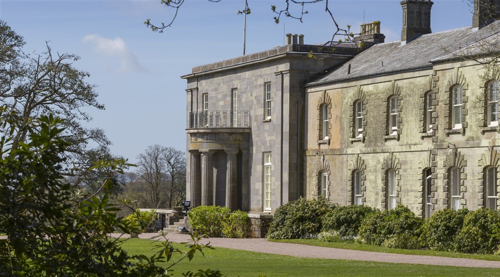 A view of the south front of Arlington Court from the garden, Devon at Cloud Farmhouse in Lynton, Devon